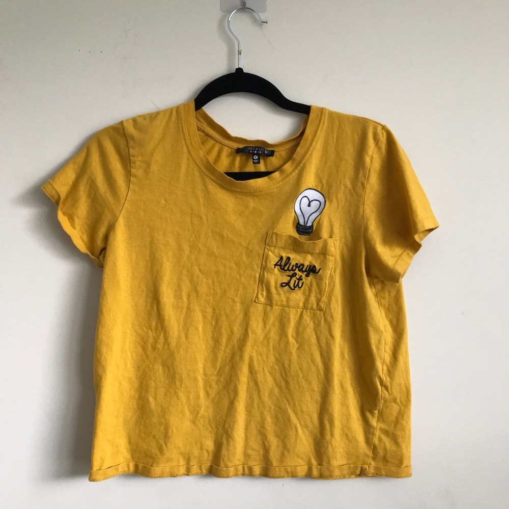 young adult yellow lightbulb graphic tee